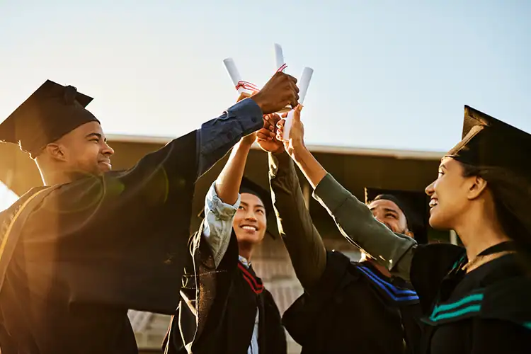 a group of MBA graduates celebrating their convocation day
