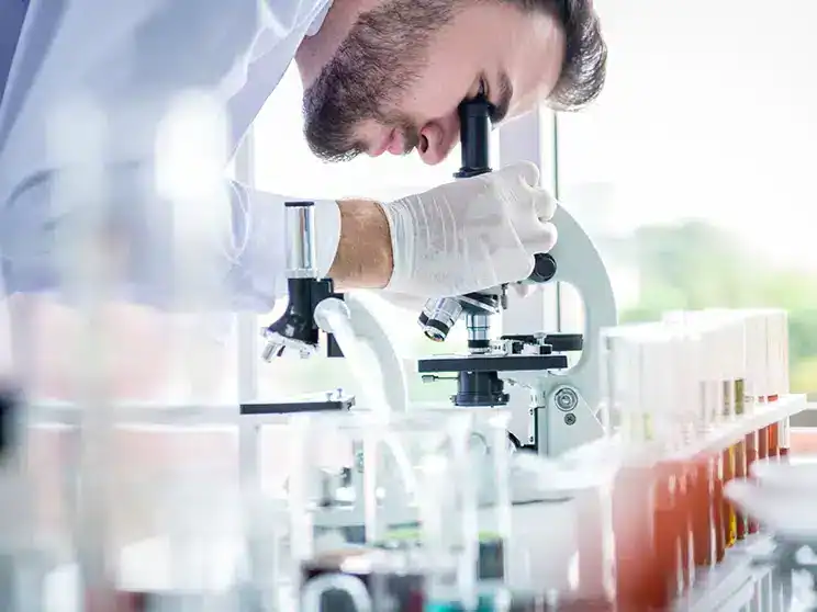 a male health science student in a laboratory