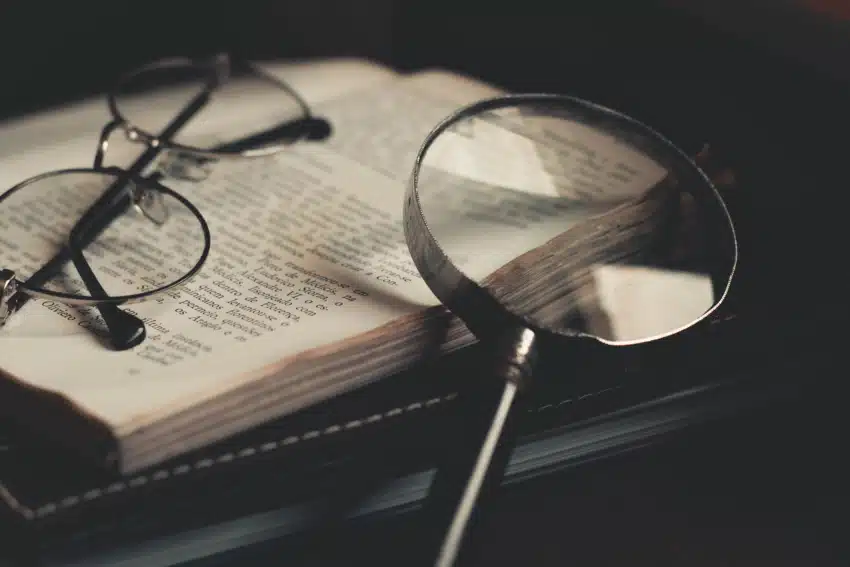 Books and a pair of glasses that belong to a student