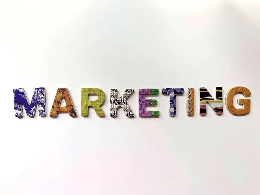 Marketing displayed in colored letters on white background