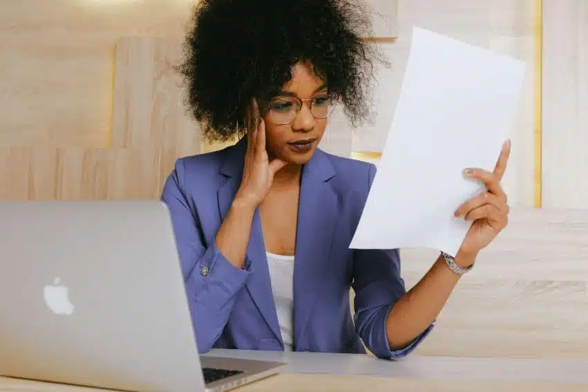 Actuary analyzing risk management for her company