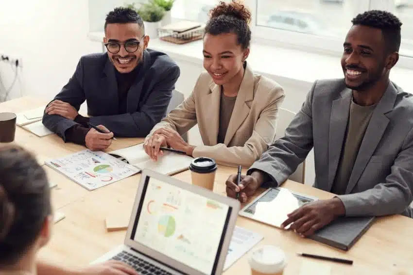 Three business people at a desk