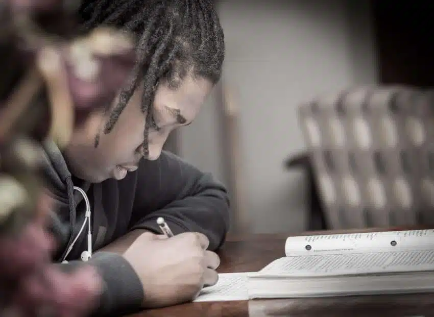 Student taking a test with an open-book